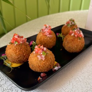 ARROZ CON PATO CROCANTE A LA HUANCAINA Y PICO DE GALLO